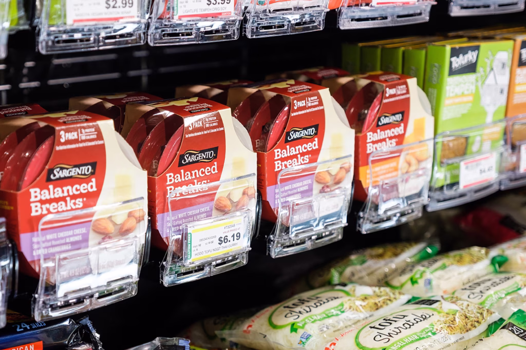 prepackaged meat, cheese, and nut snacks retail display